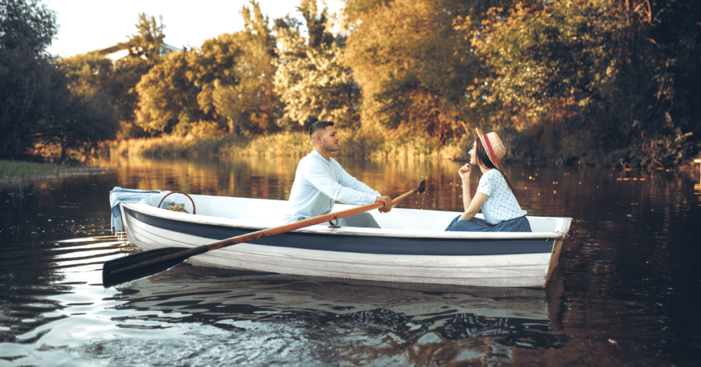 couple boating together on lake